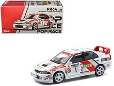 Mitsubishi Lancer Evolution IV RHD Tommi Makinen Seppo Harjanne Winner 1/64 #1