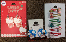 claire's hello kitty earings, snowglobe earings, and christmas hair pins pack