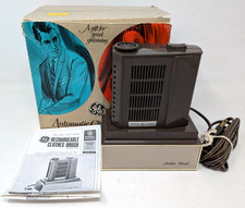 Vintage General Electric GE Automatic Clothes Brush Rechargeable Model VV2 USA