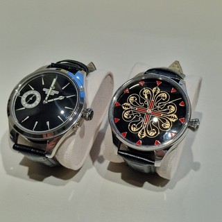 A pair of custom made wristwatches repurposed from vintage Swiss pocket watches.