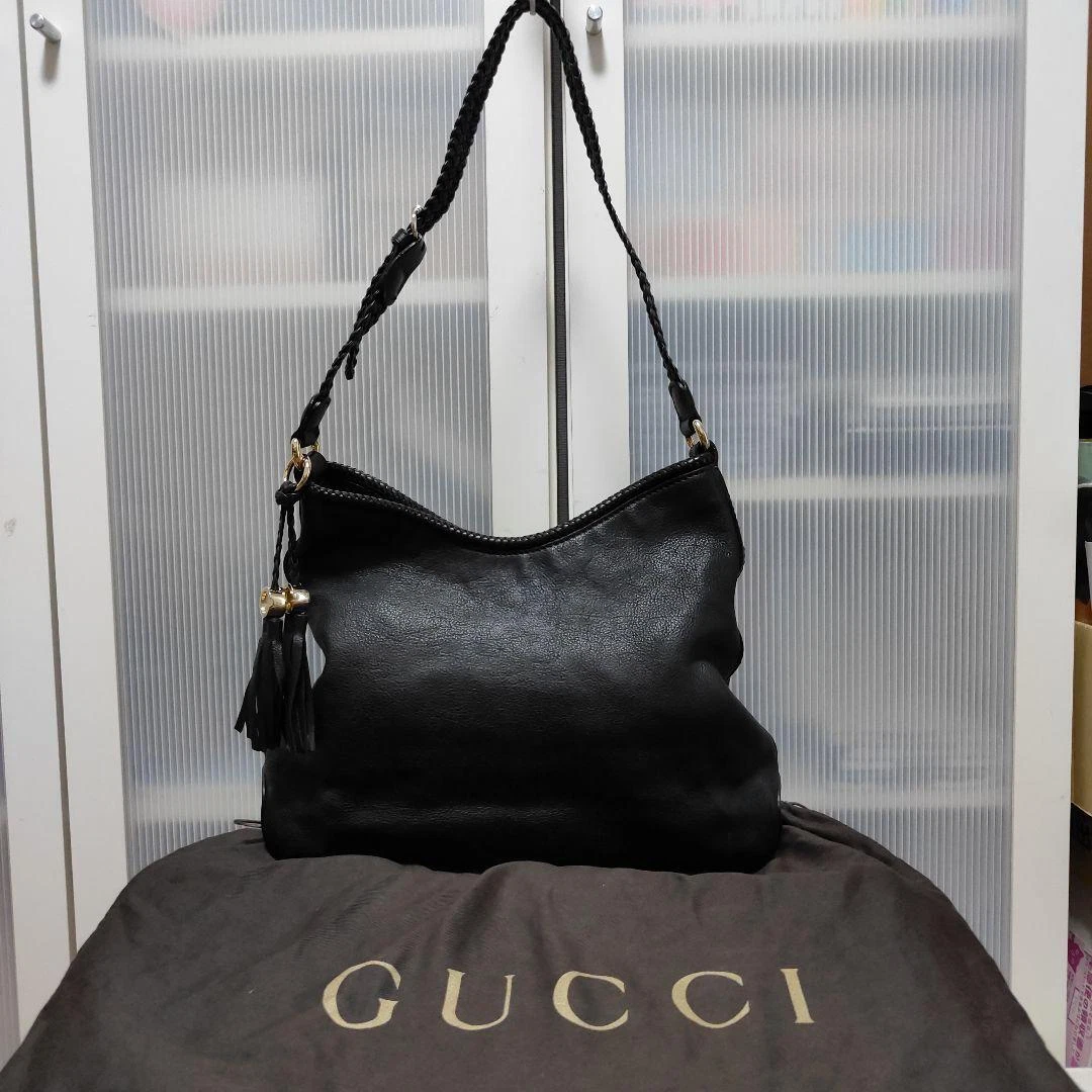 ^*5275 Sac à bandoulière GUCCI, cuir, noir