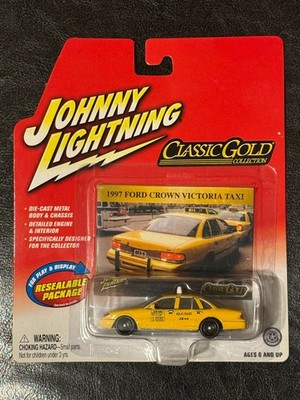 Johnny Lightning - Classic Gold - 1997 Ford Crown Victoria Taxi