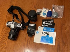 Minolta X-370 camera JC Penney 0–50mm ProSpec 135 mm Lens Manuals Clean Works 