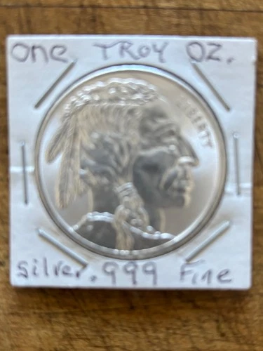 one troy ounce .999 fine silver coin