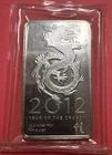 2012 SILVER YEAR OF THE DRAGON SEALED 10 TROY OZ BAR