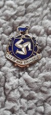 vintage Isle of Man souvenir enamel badge. Good condition.
