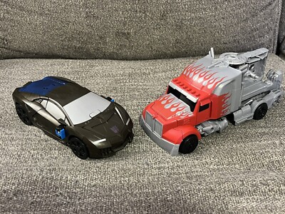 Transformer Lot 2 Flip & Change Optimus Prime Lockdown 2014 Hasbro Knight