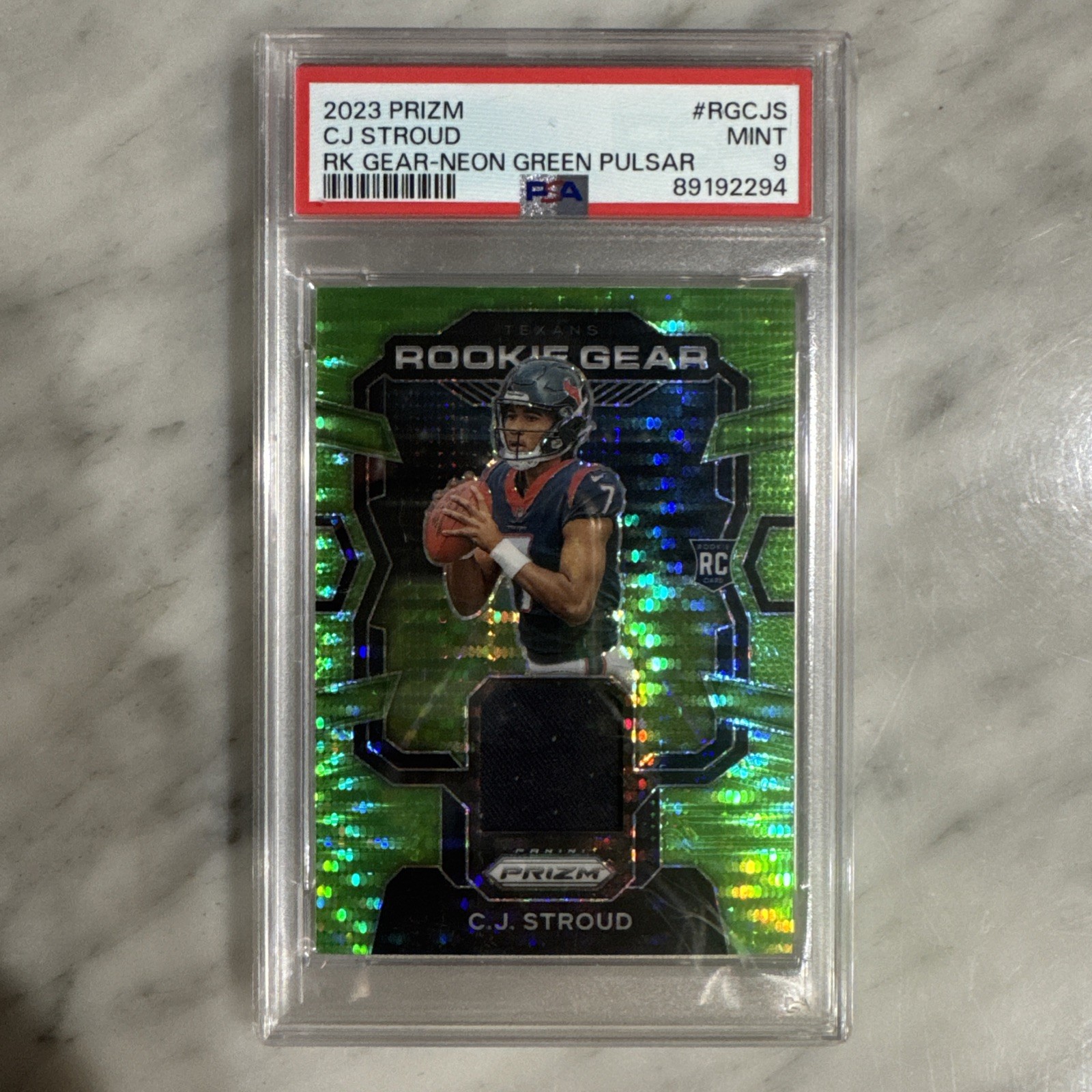 2023 Panini Prizm CJ Stroud Rookie Gear Neon Green Pulsar HOUSTON TEXANS PSA 9