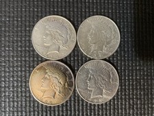 Lot of 8 Peace Dollars 1922-1935 90% Silver Circulated US Coins