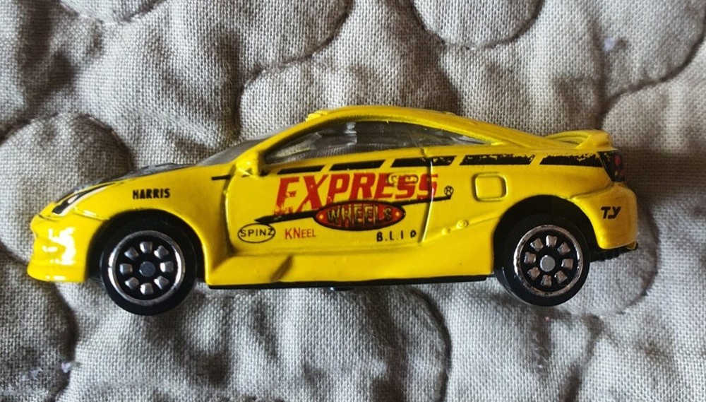 Toy Toyota Celica Die-Cast Car 1/64 - Good Condition - Yellow