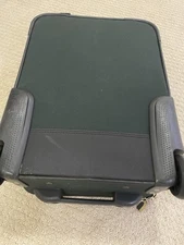 Ricardo Beverly Hills Dark Green Suitcase With Rolling Wheels. Extendable Handle