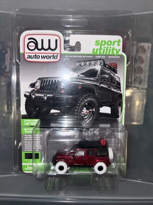 AUTO WORLD - ULTRA RED CHASE  - 2017 JEEP WRANGLER SAHARA With Diamond Protector