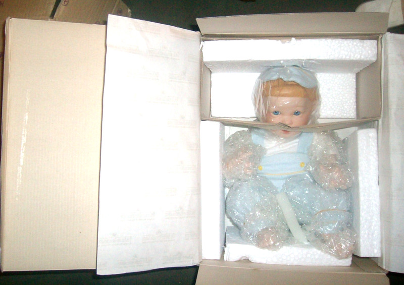 ASHTON DRAKE Baby's First Tooth Porcelain Boy Doll