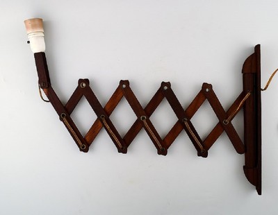 Erik Hansen: An oak sax wall lamp.  Danish design 60/70s.