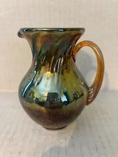 VINTAGE SMALL ORANGISH LUSTER SMALL PITCHER WITH ORANGE RIBBED HANDLE 4-½" HIGH