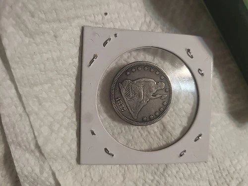 1877-CC Seated Liberty Quarter VF/XF Condition