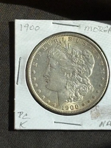1900 MORGAN SILVER DOLLAR AU