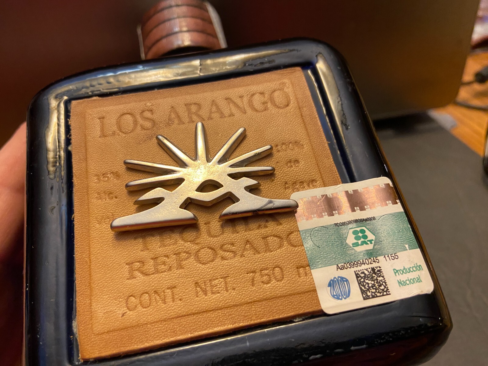 Los Arango special edition cobalt blue leather label tequila bottle