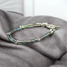 7 1/2" Glass tube beaded bracelet with silver accents and toggle closure