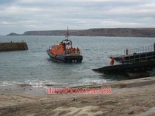 PHOTO  RETURNING THE LIFEBOAT TO THE LIFEBOAT HOUSE THE NEW TAMAR CLASS LIFEBOAT