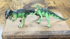 Carnegie Collection dinosaur models original and revised Allosaurus