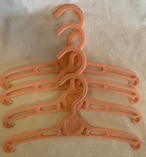 Set of 4 Vintage Mid-Century Pink Plastic Heart Baby Clothes Hangers