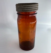 Vintage HELME`S RAILROAD MILLS AMBER GLASS JAR WITH LID - NICE