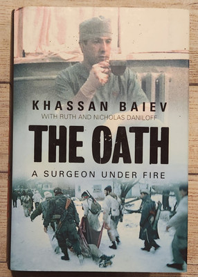THE OATH : A SURGEON UNDER FIRE By Khassan Baiev **Mint Condition**