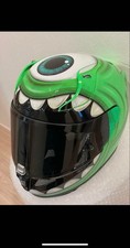 HJC Motorcycle Helmets featuring vibrant lime green paint job on Mike Wazowski