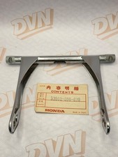 NOS HONDA CL90 CL 90 SCRAMBLER OEM REAR TURN SIGNAL STAY BRACKET 33602-056-670