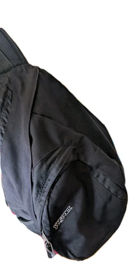 Mochila negra con una correa bandolera Jansport Airlift Y2K Foto 3 de 4