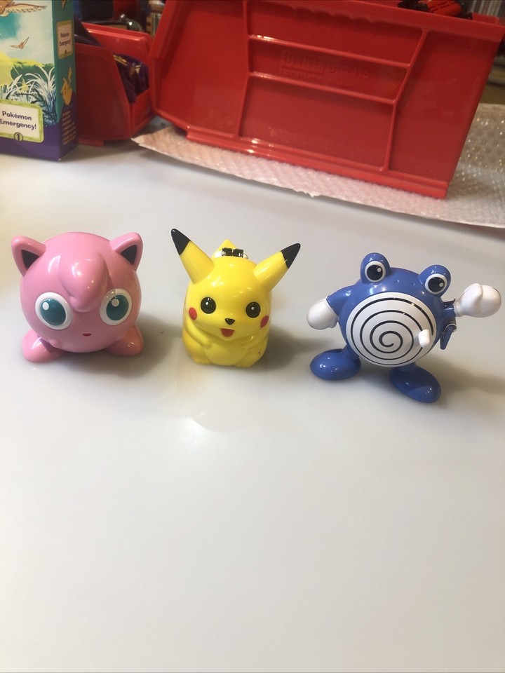 A trio of original vintage Pokémon desk figurines — Pikachu, Jigglypuff, and Poliwhirl keeping watch over your workspace in first-gen glory.