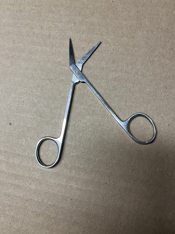 Stainless Steel Surgical Scissors. Flat Handles, Angled Blades. 4.5”. Pakistan