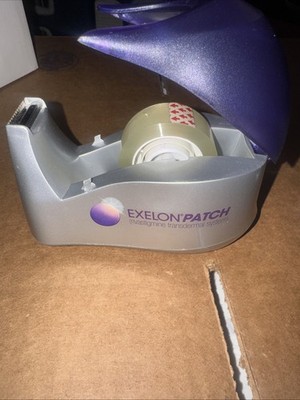 ONE EXELON PATCH DRUG REP PROMO HEAVY WEIGHTED TAPE DISPENSER