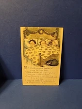 Antique Christmas Postcard SLEEPY CHILDREN NESTLE ALL SNUG BED CAT Uncirculated