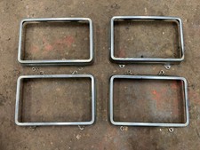 70s/80s american car oldsmobile cadillac headlight trims 