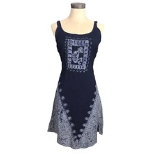 Pretty blue dress with embroidered and tie-dye detailing, featuring a Kokopelli 
