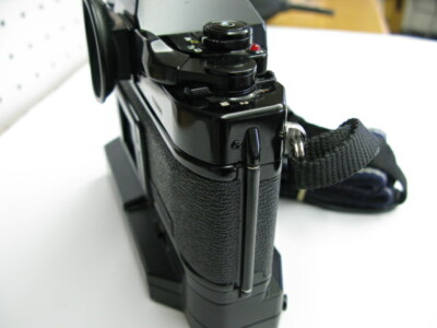 Canon A-1 film camera body with Genuine strap and Power Winder A2