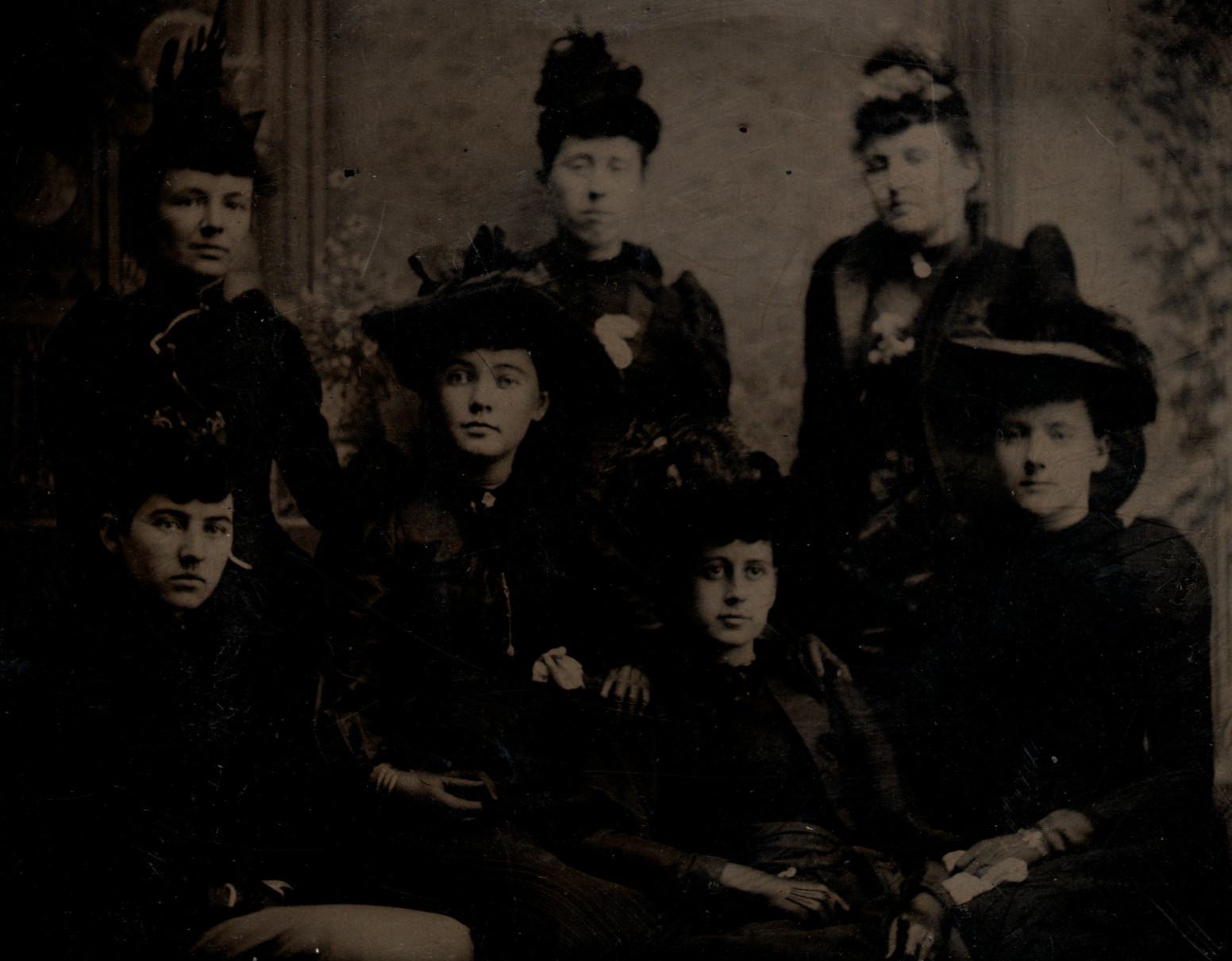 CIRCA 1850s TINTYPE GROUP OF 7 WOMEN IN BLACK FORMAL CLOTHING AND HATS — additional view