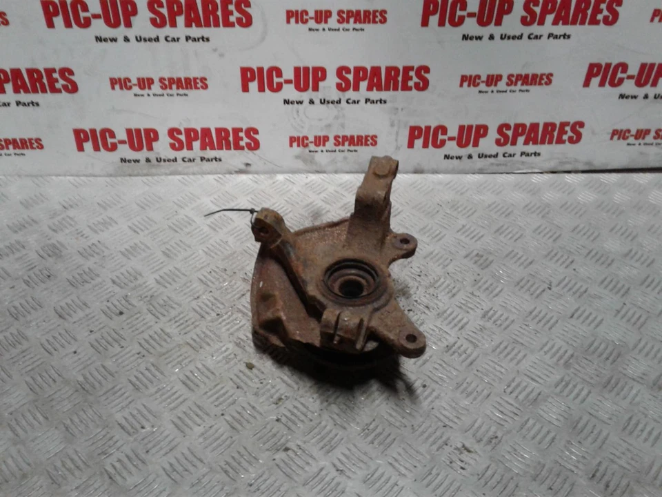 Buje delantero pasajero Mazda 626 97-00 1.8 gasolina N/S sin abs 141596 Foto 2 de 2