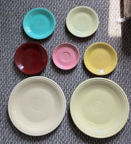 SET OF 7 FIESTAWARE BY HOMER LAUGHLIN SERVING PLATES & SAUCERS (PLEASE LOOK)