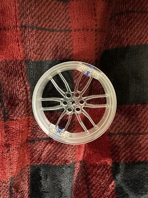LEGO Transparent Wheel Rim (Design ID 88517).  75mm in diameter and 17mm in widt