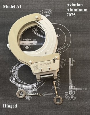 A1:  Hinged handcuffs which enhance the safety of individuals and police