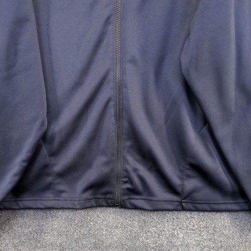 Dark blue men's full zip jacket with front pockets, zipper closure, and "Made in USA" label on back.