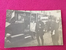 RPPC antique MILITARY vintage POSTCARD men in UNIFORM insignia PIPE car STREET