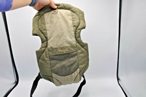 green baby carrier