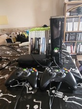 Xbox 360 Slim 250gb two controllers games