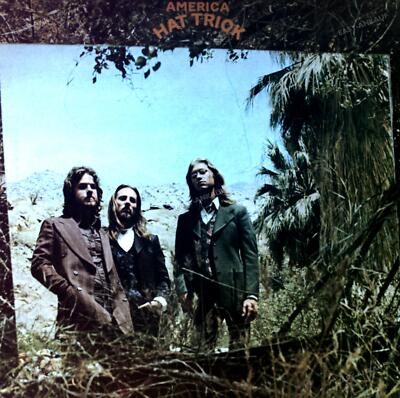 America - Hat Trick LP + Poster (VG/VG) .