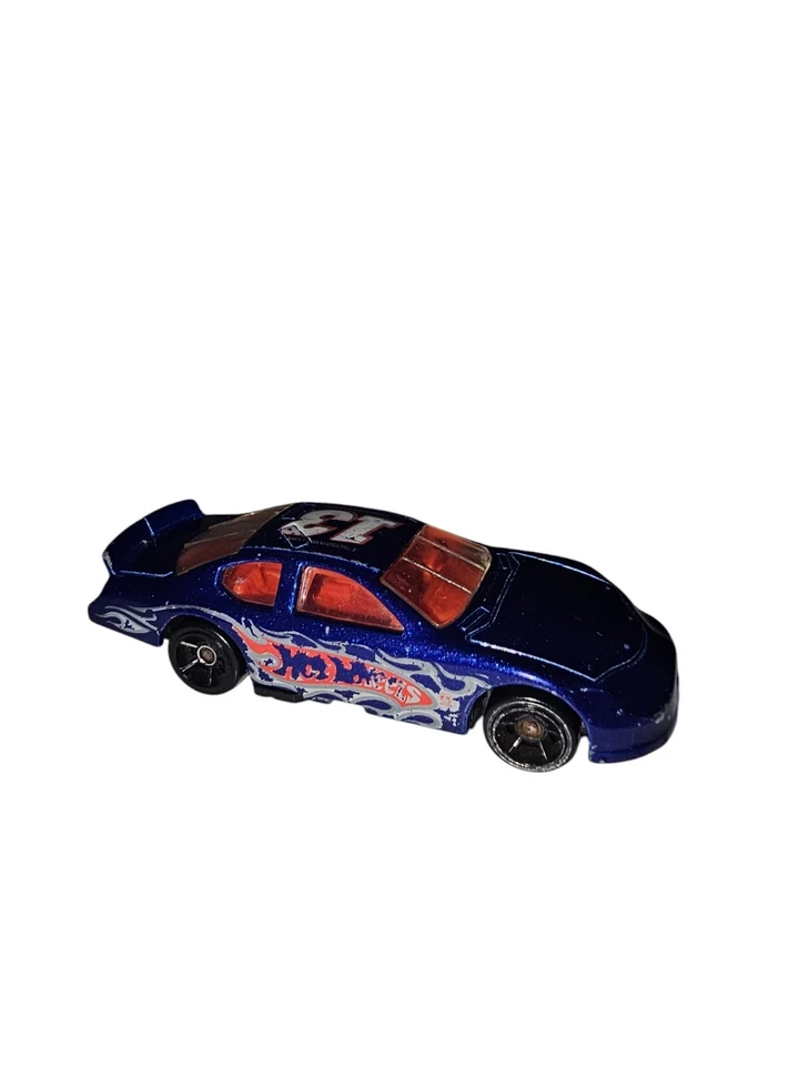 Dodge Charger NASCAR número 13 Hot Wheels logotipo de coche de stock azul carreras Foto 2 de 4
