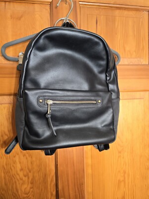 Kaari Blue Faux Black Leather Small Backpack Polyurethane Outer Polyester Inner.